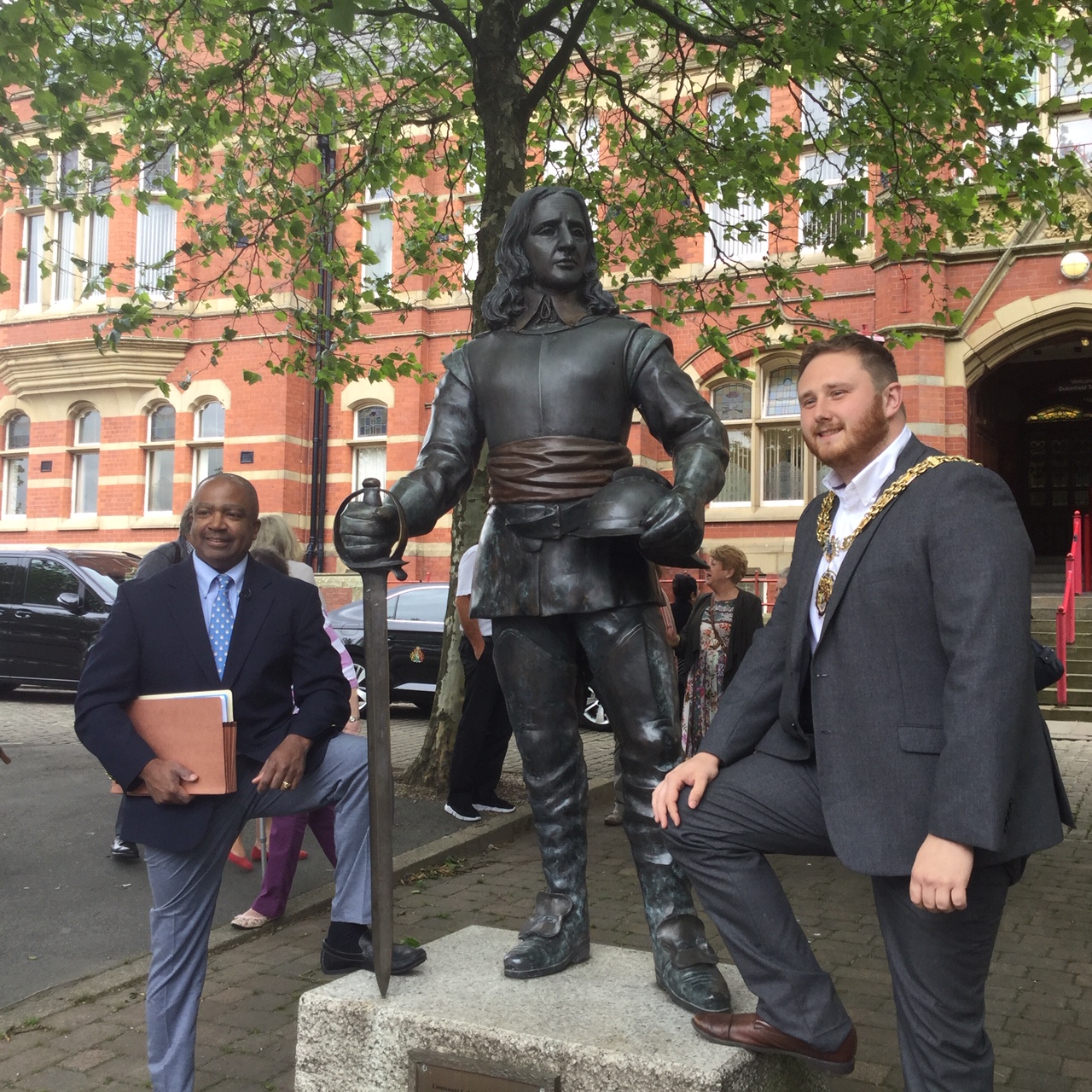 picture of Thomas with his Ancestor's Statue outside Dukinfield Town Hall